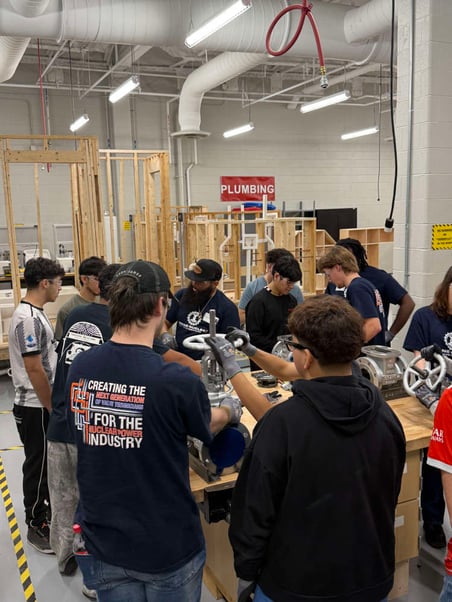 Young professionals taking part in the company’s new Crane Valve Institute, a six-week, hands-on training program is designed to quickly prepare individuals for high-demand technical roles.